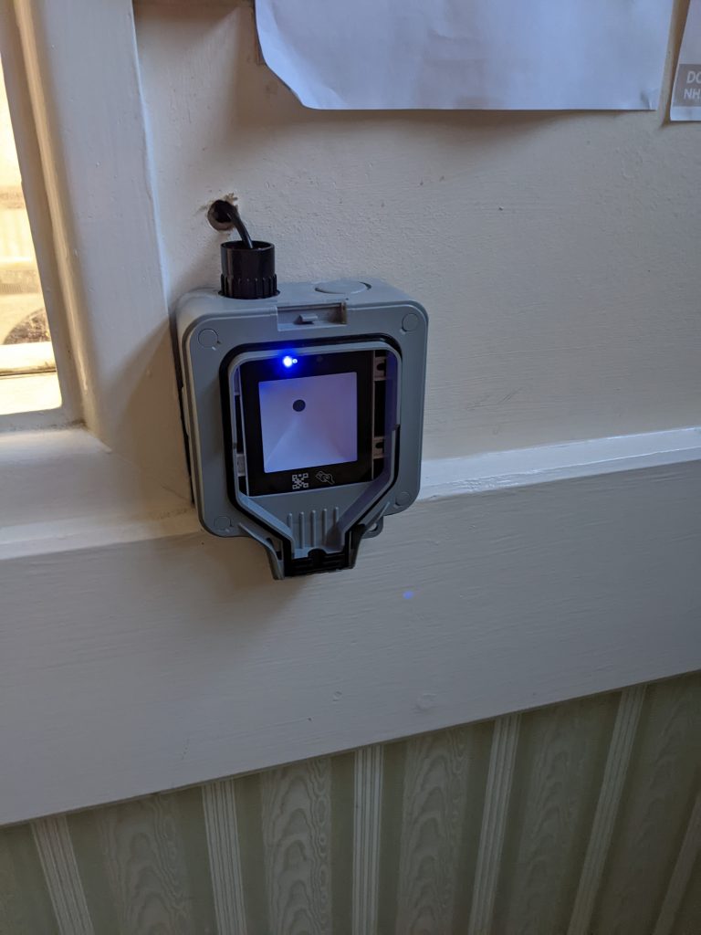 Door access barcode - QR, NFC scanner mounted to the wall